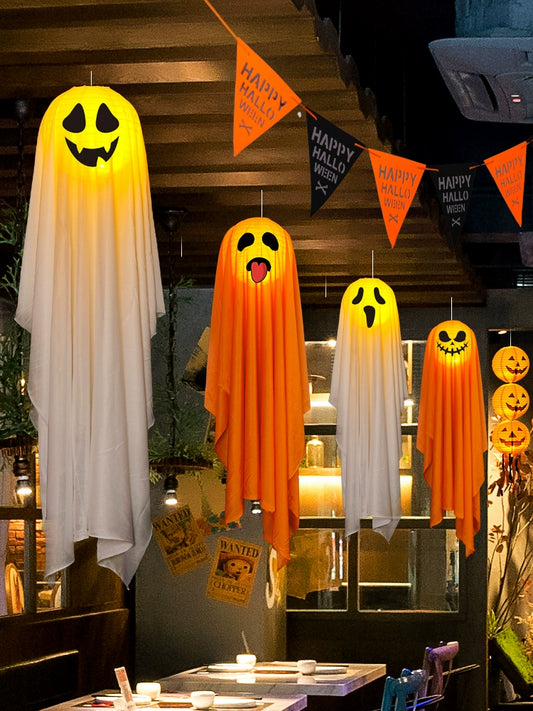 Halloween ghost pumpkin lamp decorations hanging in a festive setting for Halloween celebrations