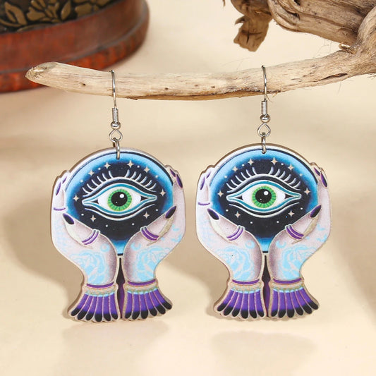 Colorful Halloween devil eye earrings with intricate design featuring hands and an evil eye motif