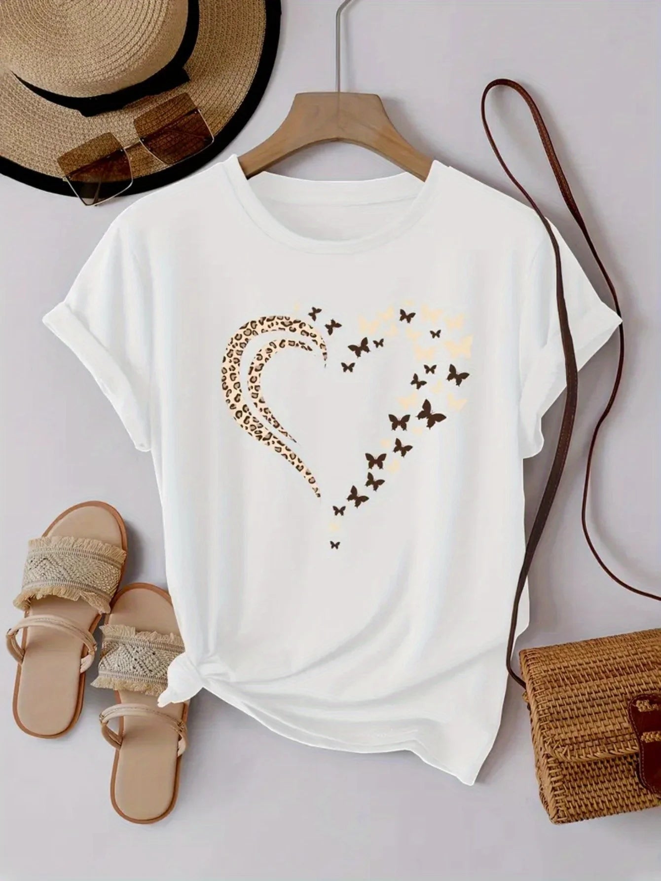 EtherealBe stylish women's heart print shirt featuring a gold butterfly design on a white background