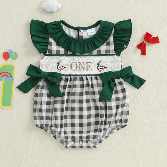 Plaid patchwork romper for infants with ruffled sleeves and green accents for playful style
