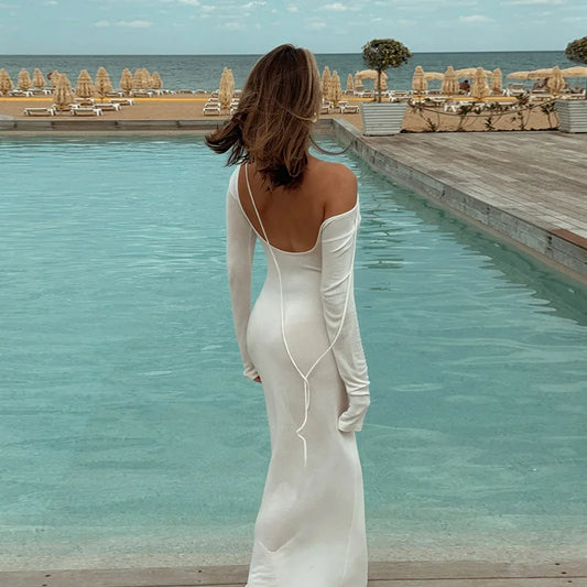 Elegant off shoulder evening dress in white, featuring long sleeves and a flowing silhouette by EtherealBe