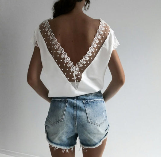 Hollow lace wavy deep V blouse