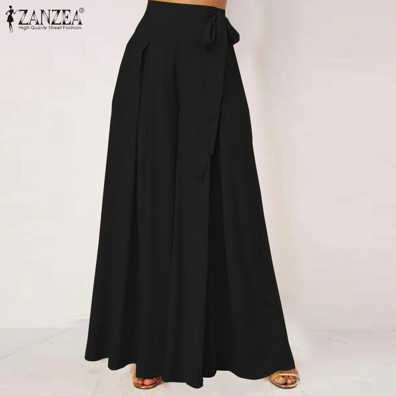 Chic fall flare trousers in black with a stylish tie waist for a fashionable autumn look