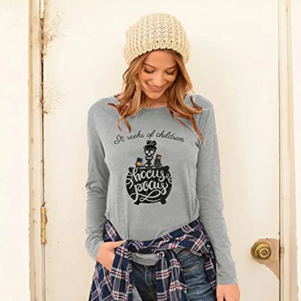 Womens Halloween shirt long sleeve featuring a playful design with a cauldron and spooky text