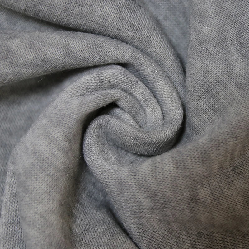 Soft gray fabric of a Halloween witch hat sweatshirt for women, showcasing cozy texture.