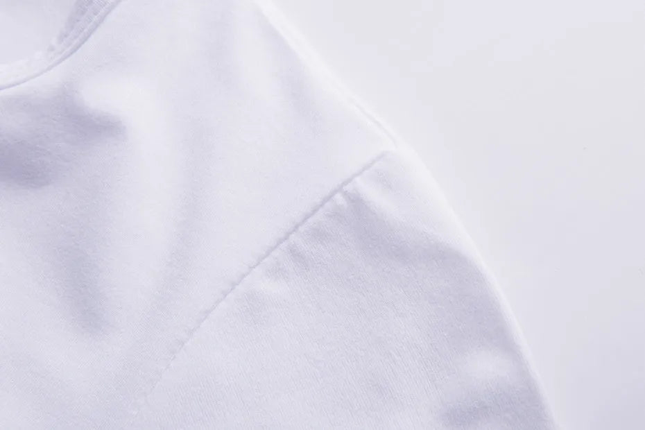Close-up of a white fabric featuring a Halloween graphic t-shirt for women by EtherealBe
