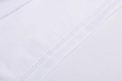 Close-up of white fabric stitching on an EtherealBe Halloween graphic t-shirt for women