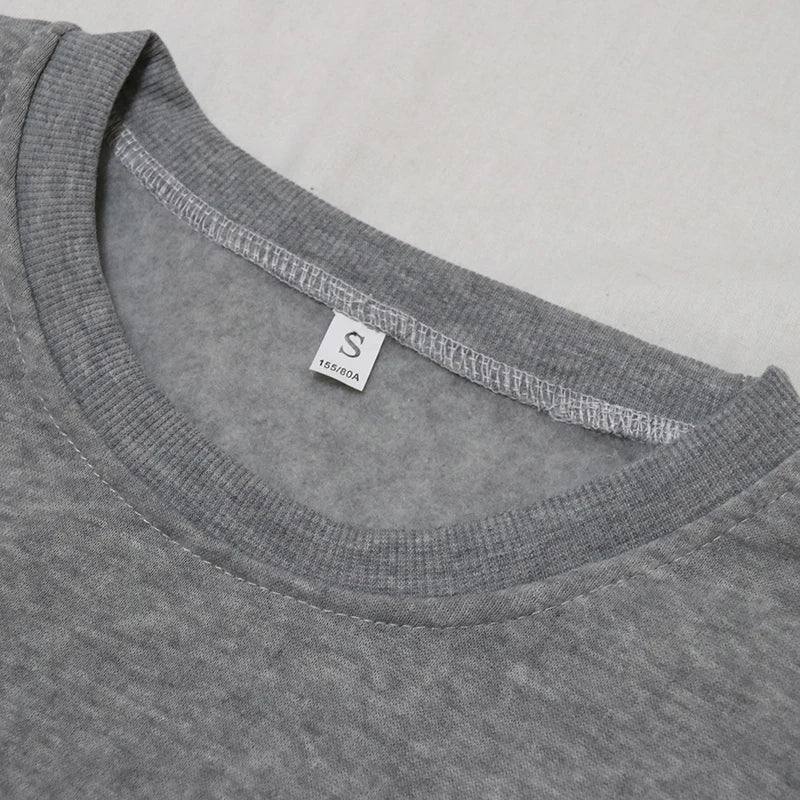 Gray neckline of EtherealBe Halloween witch hat sweatshirt for women designed for comfort and style
