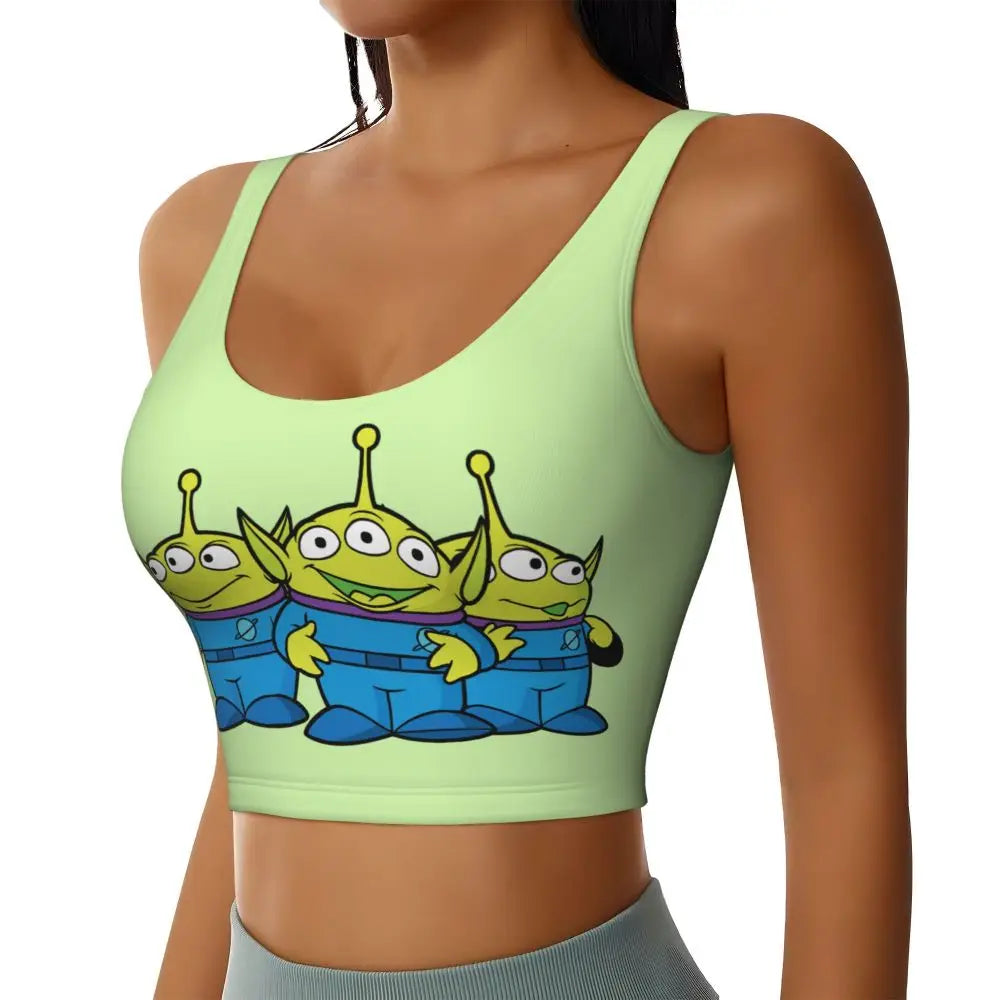 EtherealBe Toy Story Jessie sports bra featuring playful green design with Aliens in blue outfits