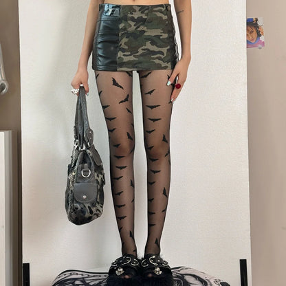 EtherealBe Halloween bat pattern tights for women styled with a camo skirt and chic accessories