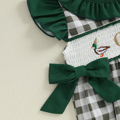 EtherealBe plaid patchwork romper for infants with decorative smocking and bow detail