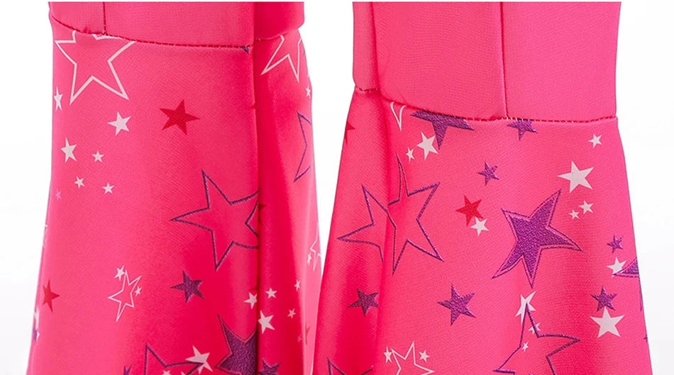Close up of bright pink star print boot covers from pink cowgirl cosplay set for kids showing glossy fabric detail