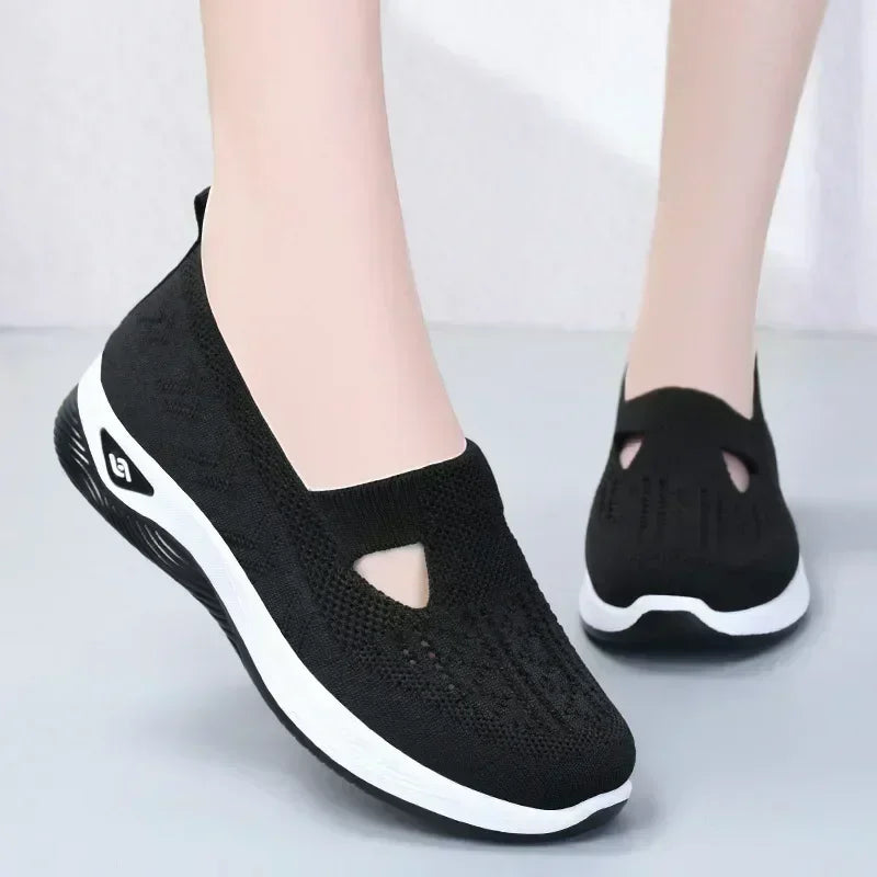 EtherealBe lightweight women's walking flats in black with breathable design for comfortable all-day wear