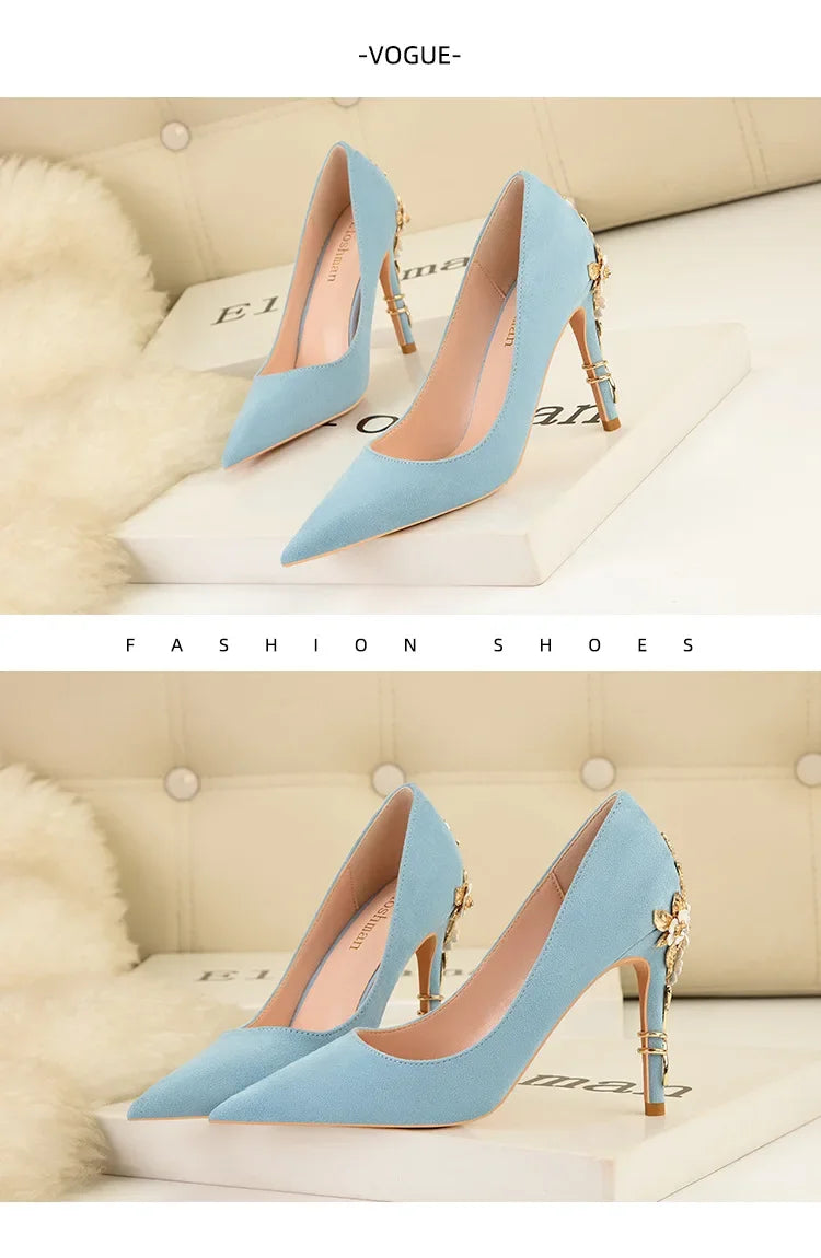 Elegant blue flower embellished women's heels with stylish pointed toe and decorative details