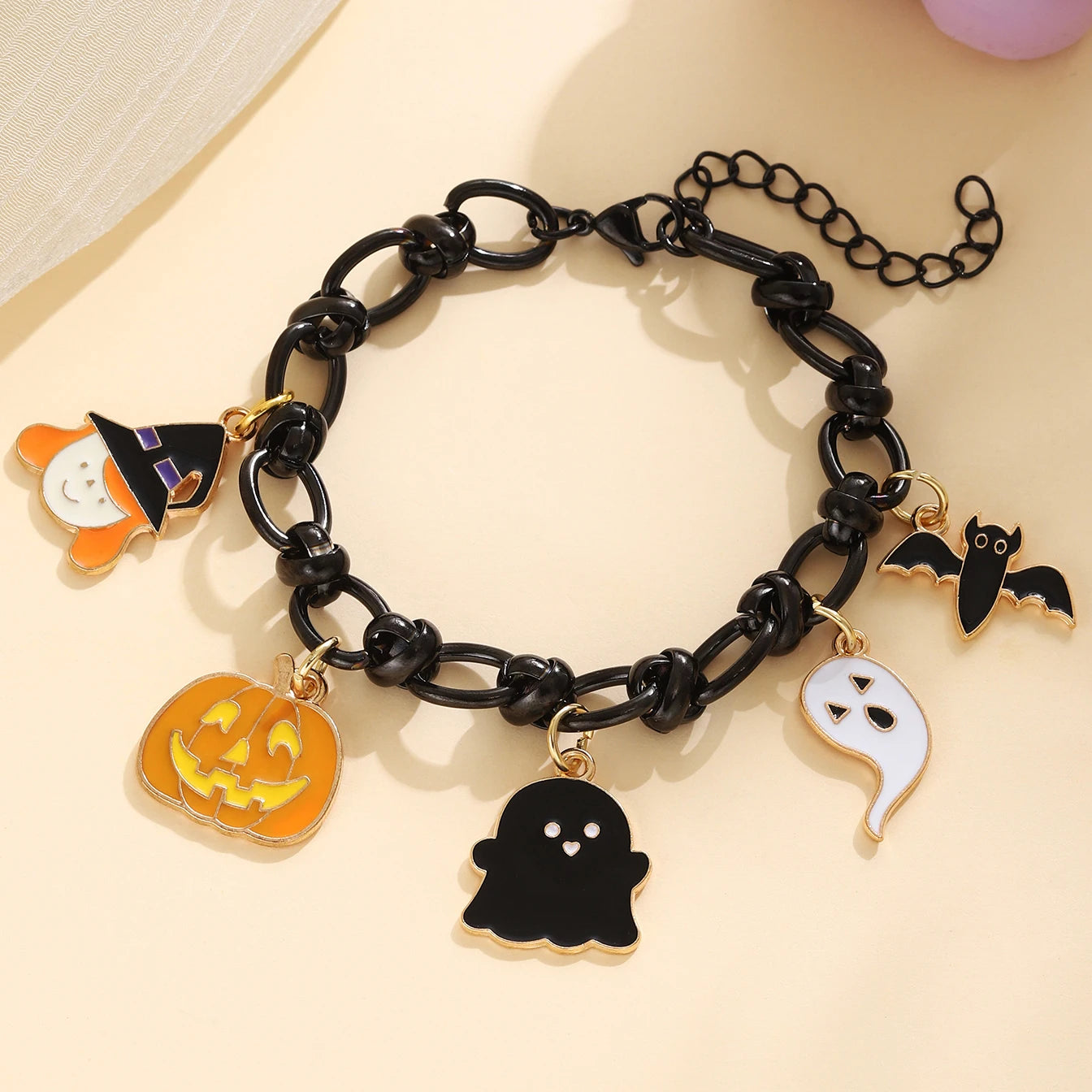 EtherealBe Halloween charm bracelet for women featuring spooky charms like a pumpkin, ghost, and witch