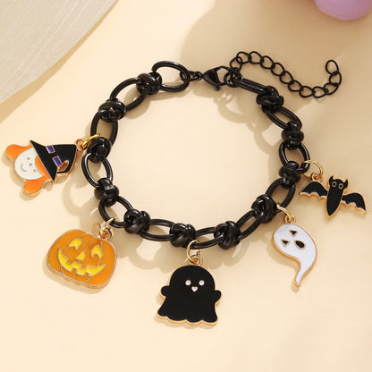EtherealBe Halloween charm bracelet for women featuring spooky charms like a pumpkin, ghost, and witch
