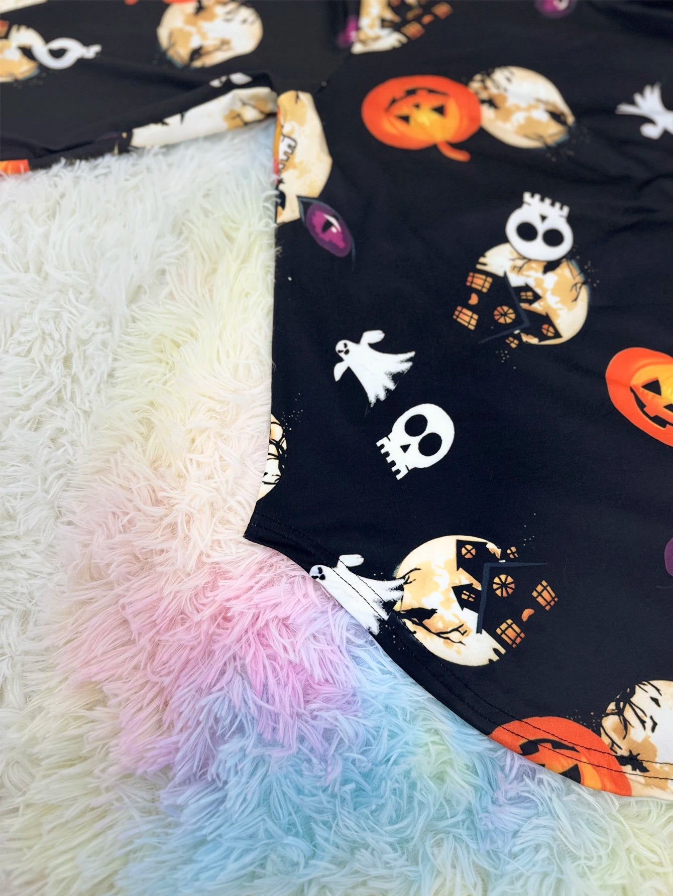 EtherealBe plus size Halloween pumpkin T-shirt featuring festive prints on a dark background