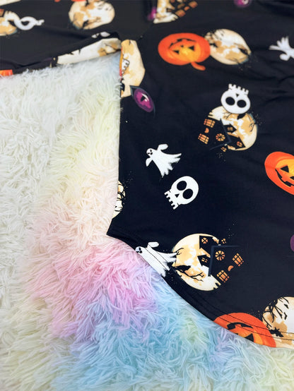 EtherealBe plus size Halloween pumpkin T-shirt featuring festive prints on a dark background