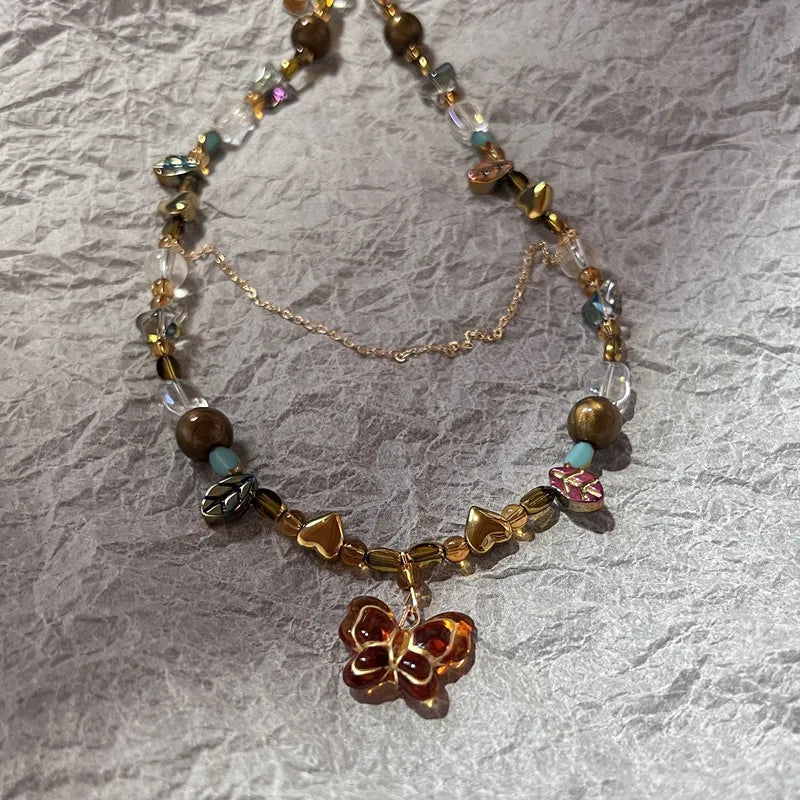 EtherealBe Y2K opal necklace for women featuring colorful beads and a butterfly charm
