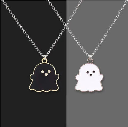 EtherealBe Halloween ghost pendant necklace in black and white with cute facial details