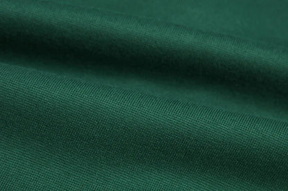 Close up dark green fabric texture of EtherealBe spider web zipper hoodie for women showing knit detail
