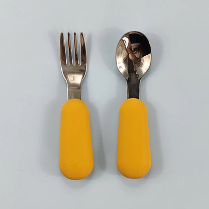 EtherealBe stainless steel baby utensils set featuring yellow soft-grip handles for easy handling