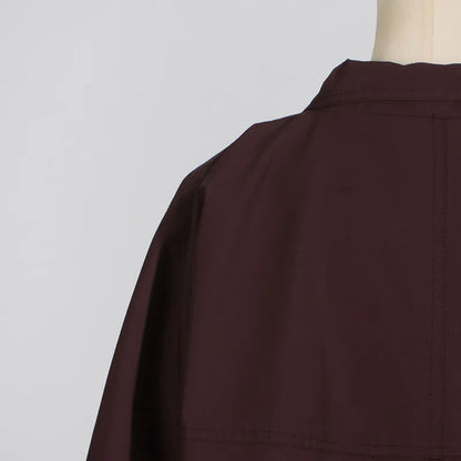 EtherealBe simple style long sleeve trench coat in deep burgundy with a clean and elegant design