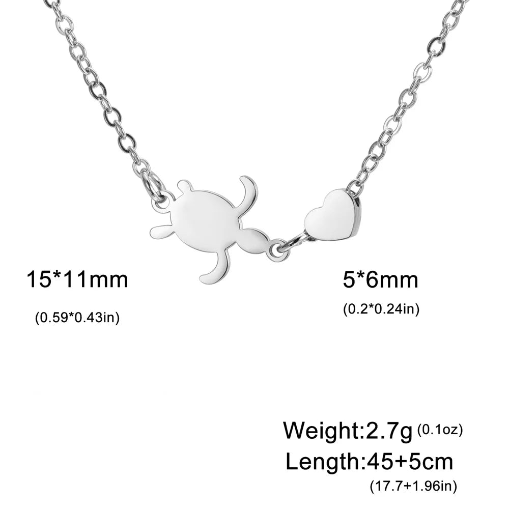 Silver sea turtle pendant necklace for women with a heart charm and adjustable length