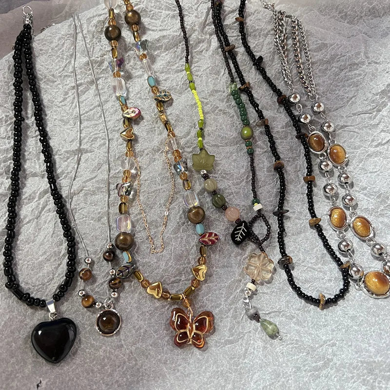 Collection of Y2K opal necklace for women featuring multi-colored beads and unique pendants