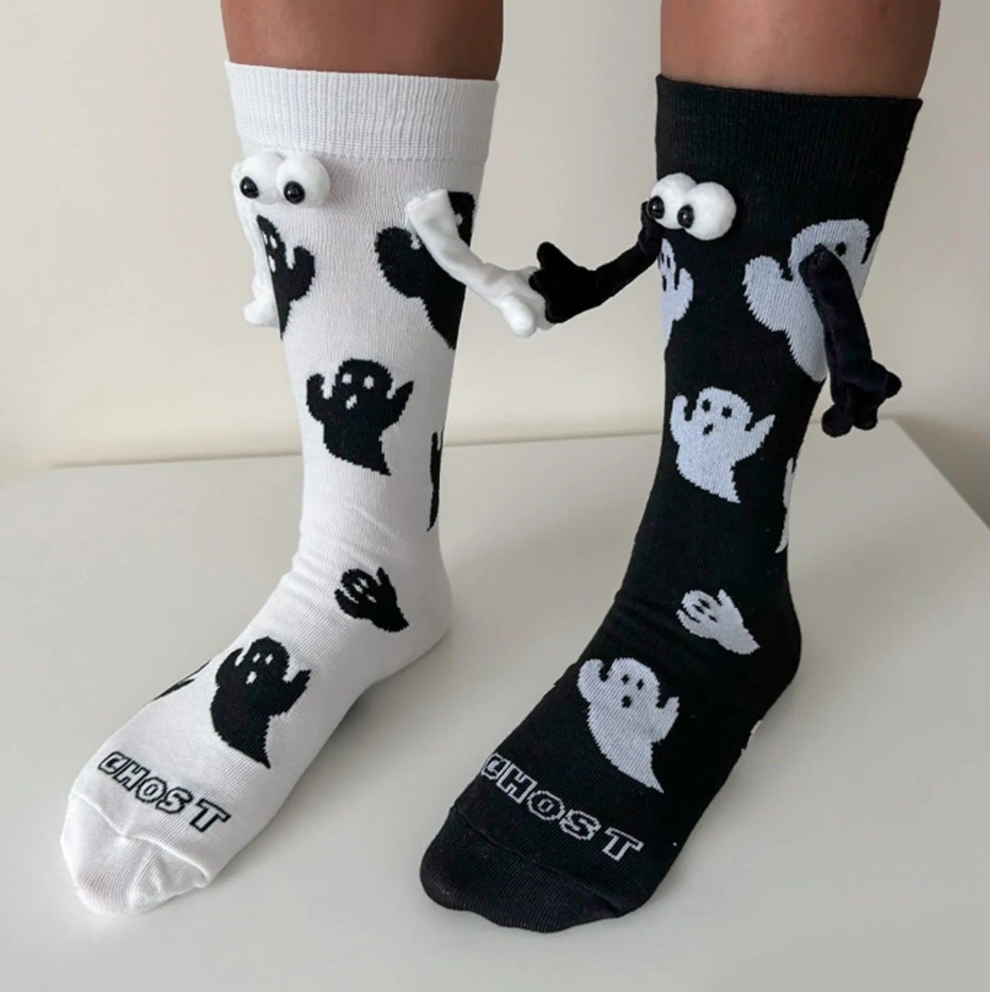 EtherealBe women Halloween socks featuring playful ghost designs in black and white