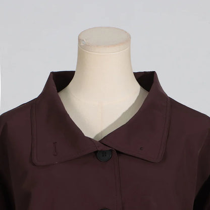 Simple style long sleeve trench coat in dark burgundy with a classic collar and button closure