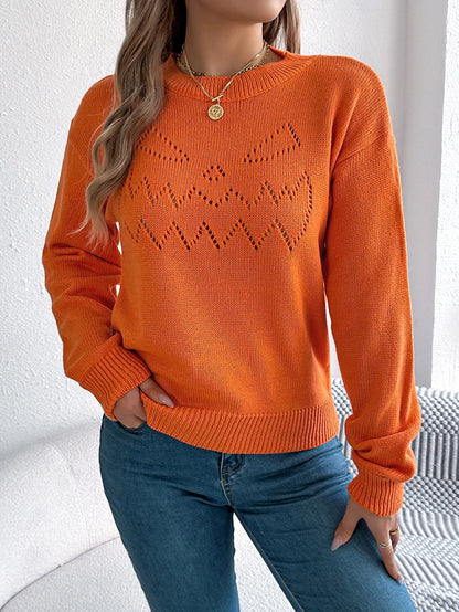 EtherealBe women's pumpkin sweater in vibrant orange with a playful jack-o'-lantern design