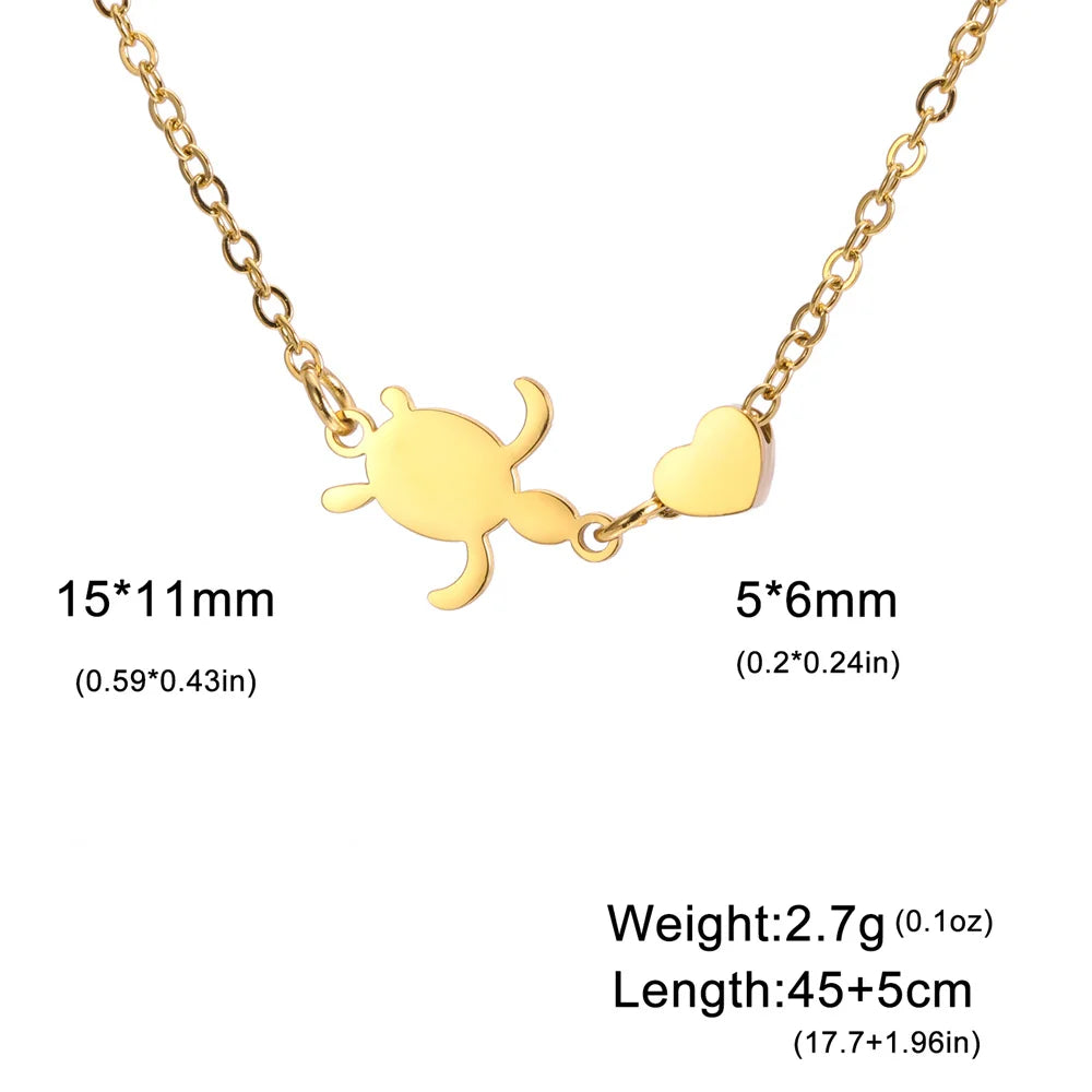 Gold sea turtle pendant necklace for women with heart charm, adjustable length and lightweight design