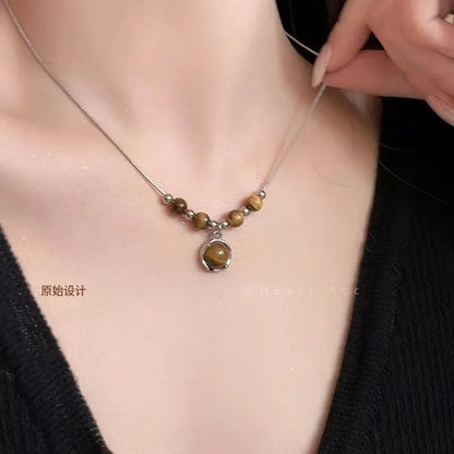 EtherealBe Y2K opal necklace for women featuring a stylish design with beads and a central pendant