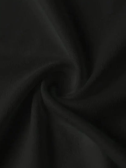 Close-up of soft black fabric for women's skeleton graphic Halloween t-shirt by EtherealBe