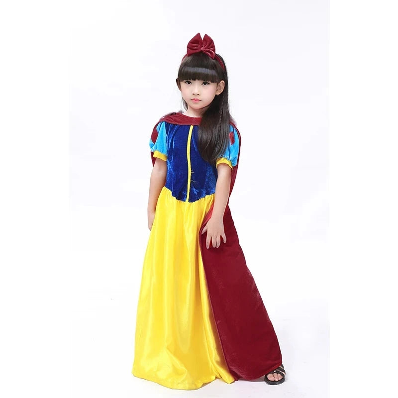 Cute girl wearing an EtherealBe Snow White Halloween party costume with a red bow and colorful dress