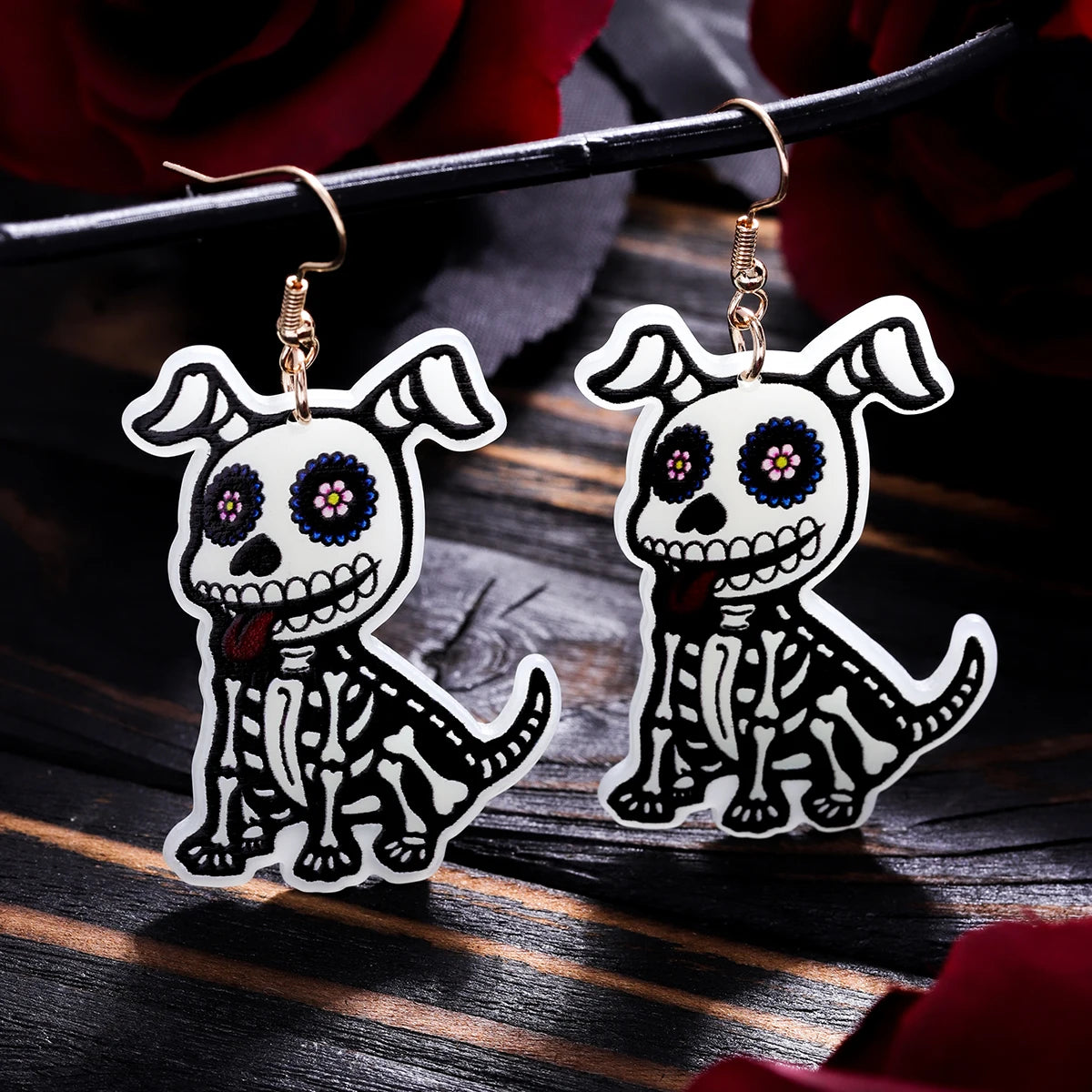Colorful Halloween earrings for women featuring playful skeleton dog design with floral accents