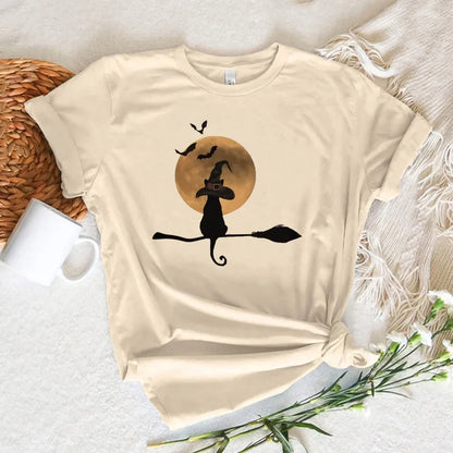 EtherealBe Halloween witch shirt women featuring a cat on a broomstick with a full moon and bats