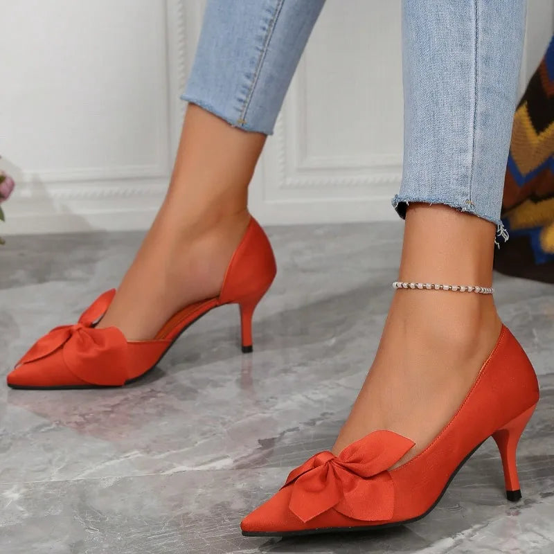 EtherealBe shallow mouth fashion heels with bow detail in vibrant red hue for stylish outings