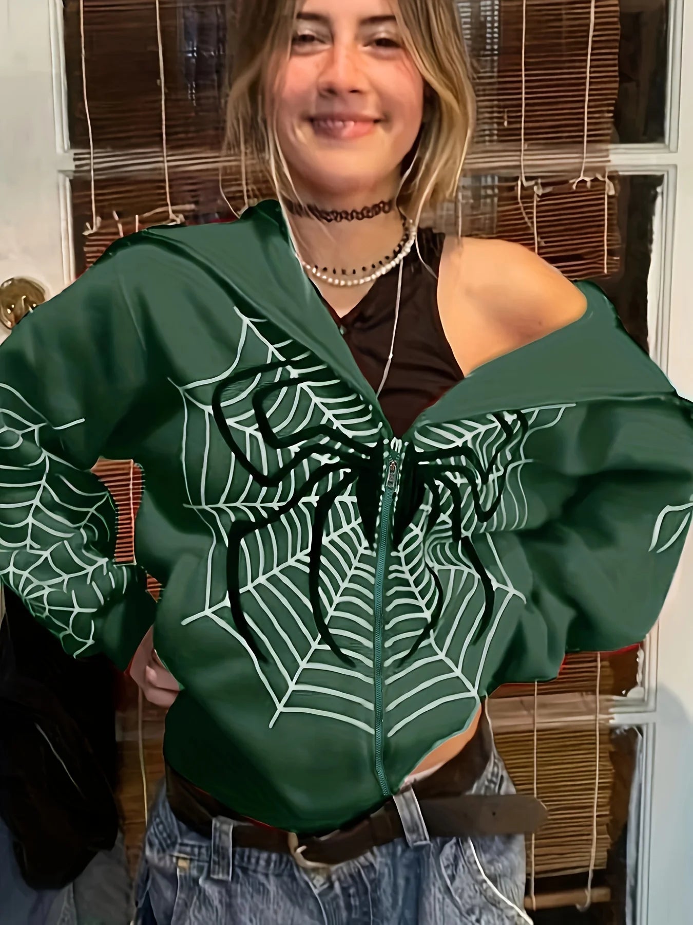 EtherealBe green spider web zipper hoodie for women styled with black crop top and layered necklaces