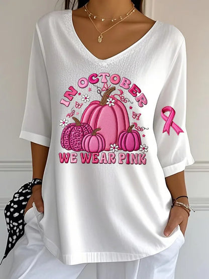 EtherealBe women's Halloween graphic t-shirt with pink pumpkins and message in October we wear pink