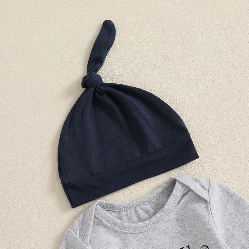 Navy hat and gray shirt from a toddler boys tractor outfit set for stylish young boys