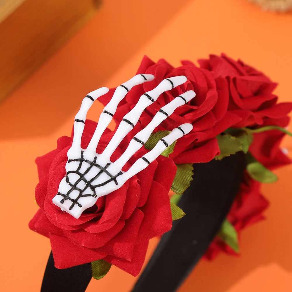 EtherealBe Halloween skeleton hand headband adorned with red roses for festive celebrations