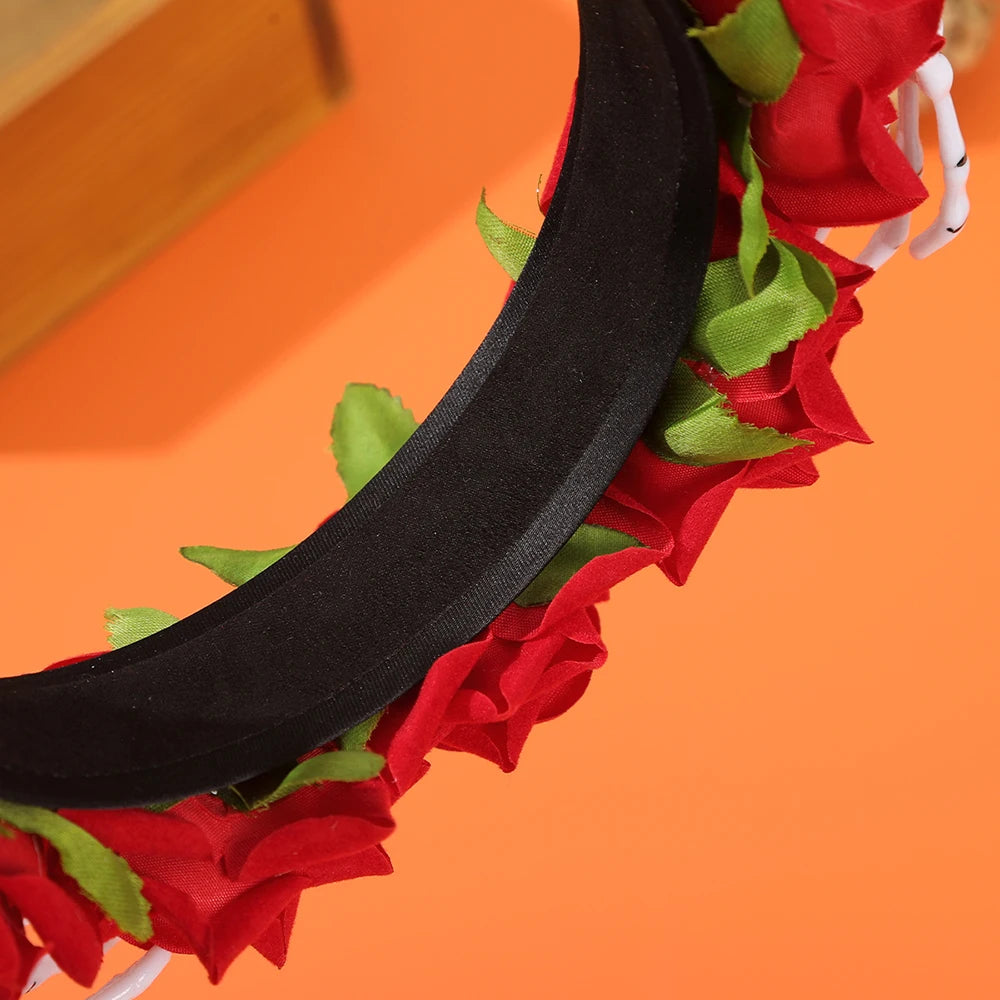 EtherealBe Halloween skeleton hand headband with red and green flower accents for festive costumes