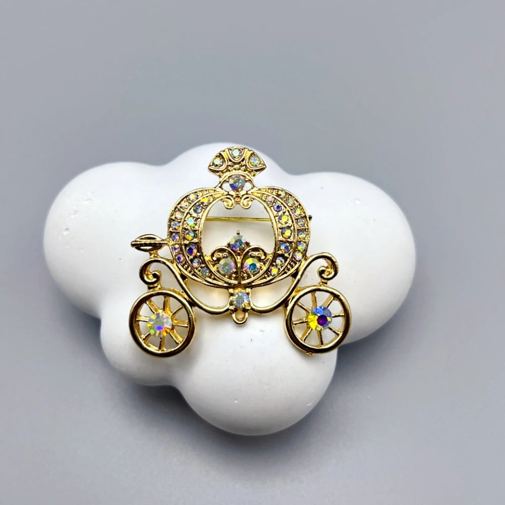 Gold and crystal carriage brooch pin, perfect for adding charm to Halloween brooch pins collection