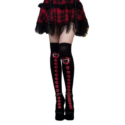 EtherealBe two-toned Halloween tights for women with playful lip and fang design, perfect for spooky festivities
