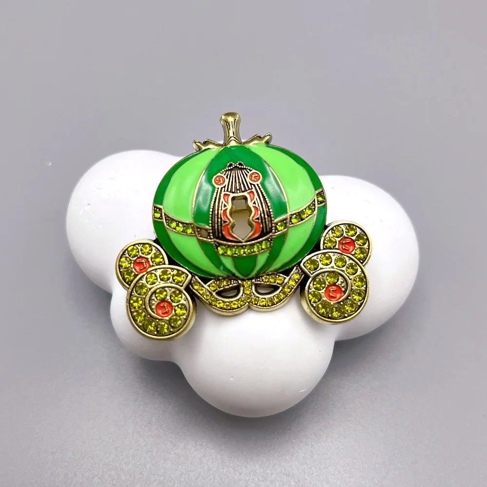 Green pumpkin carriage Halloween brooch pin with sparkling details and intricate design for festive attire
