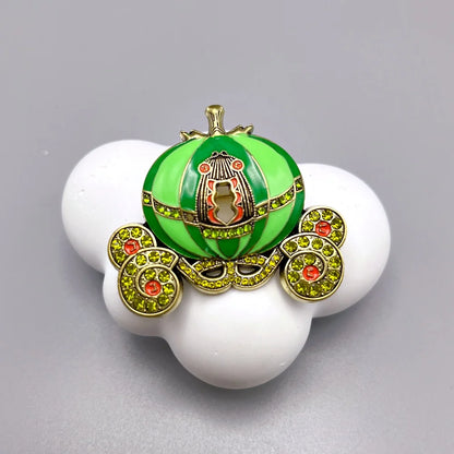 Green pumpkin carriage Halloween brooch pin with sparkling details and intricate design for festive attire