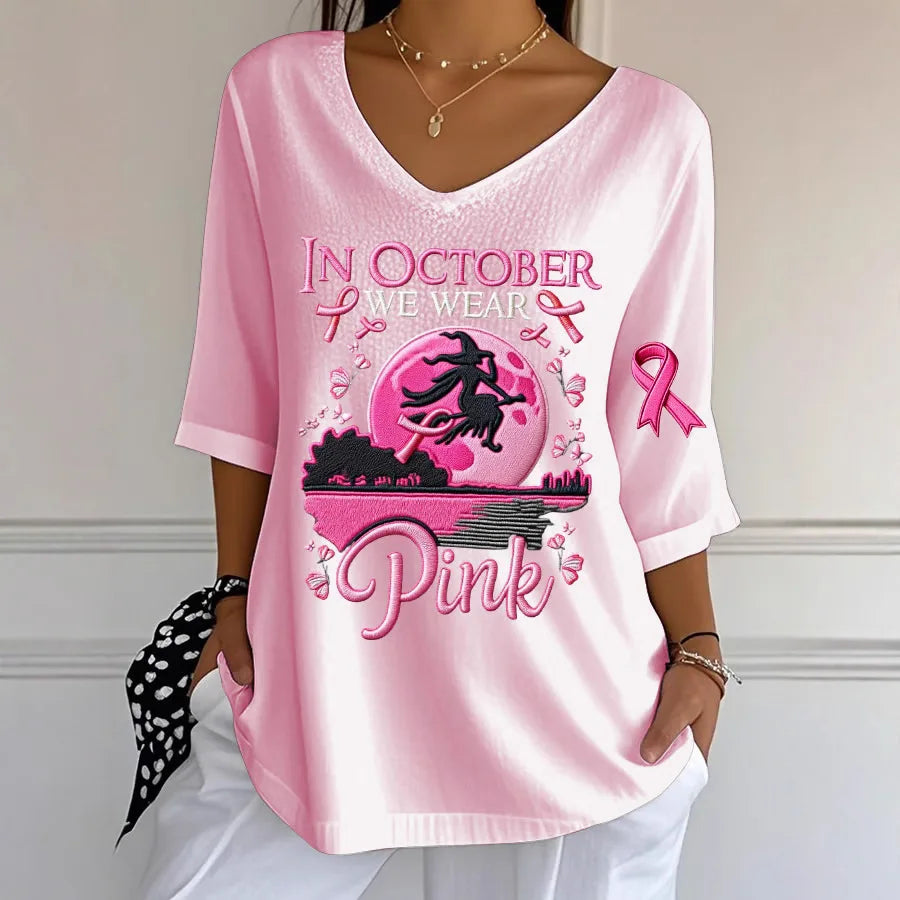EtherealBe women's Halloween graphic t-shirt in pink featuring a witch and October theme