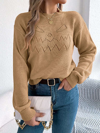 Casual women's pumpkin sweater in beige with Halloween-inspired design and ribbed neckline